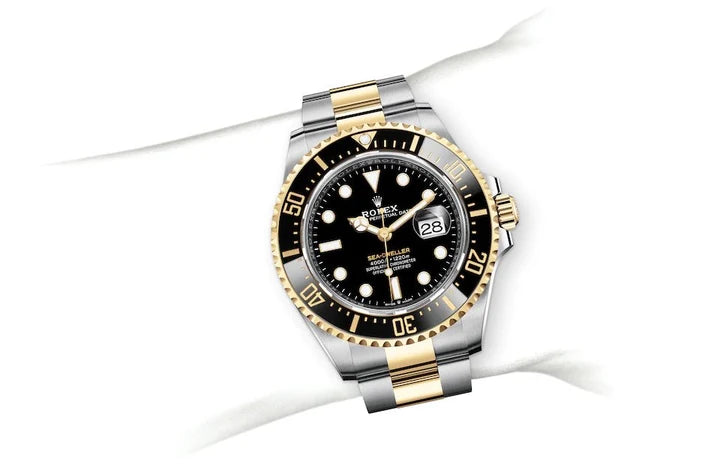 RX Sea-Dweller yellow gold Bezel and black dial comInline